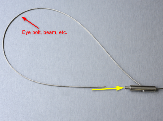 Seismic cable through bolt and back to tensioner.png